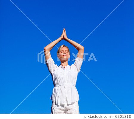 Attractive woman practising meditation 6201818