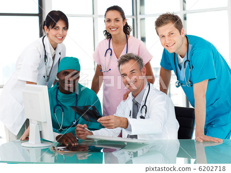 Group of doctors in a meeting Group of doctors in a meeting 6202718