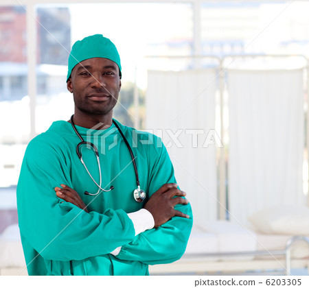 Portrait of a serious Afro-American surgeon looking at the camer 6203305