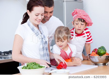 Portrait of a family preparing a meal 6203993