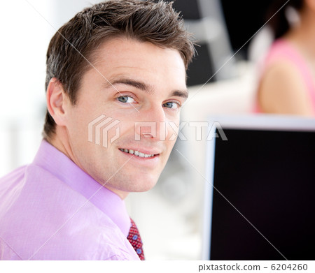 Portrait of an assertive businessman looking at the camera Portrait of an assertive businessman looking at the camera 6204260