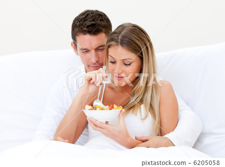 Caucasian couple having breakfast Caucasian couple having breakfast 6205058