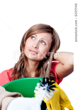 Portrait of a beautiful woman doing housework Portrait of a beautiful woman doing housework 6205548