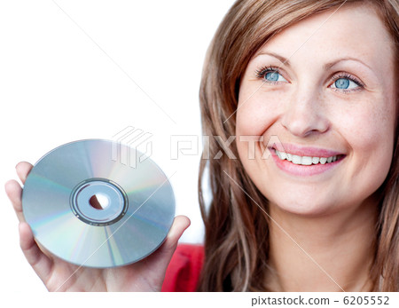 Delighted woman holding a cd-rom Delighted woman holding a cd-rom 6205552