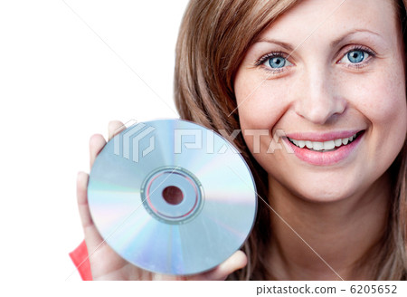 Cute woman holding a cd-rom Cute woman holding a cd-rom 6205652