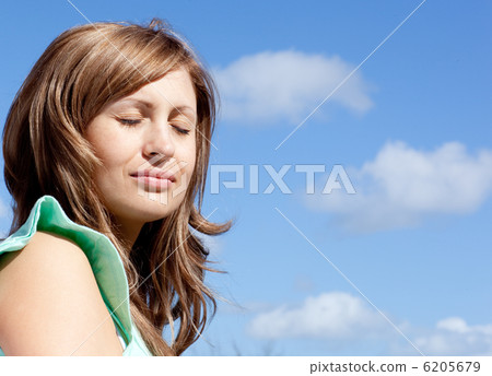 Joyful woman is relaxing outdoor Joyful woman is relaxing outdoor 6205679