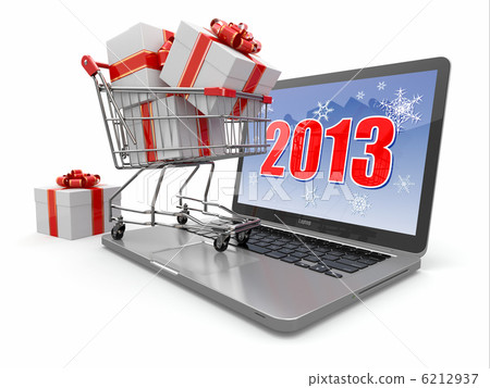 Happy new year 2013. Laptop and gifts on shopping cart. 6212937
