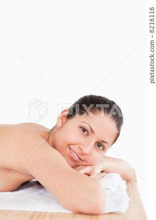 cute woman lying on a massage table 6216116