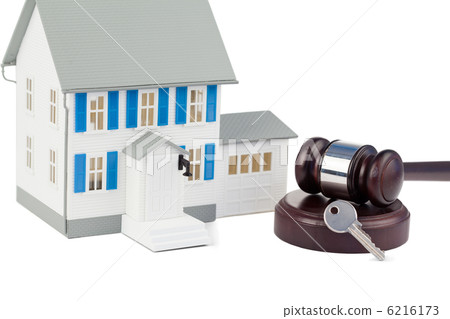 Grey toy house model with a key and a brown gave 6216173