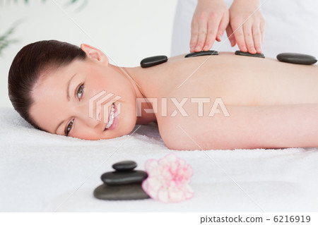 Beautiful woman having a LaStone therapy Beautiful woman having a LaStone therapy 6216919