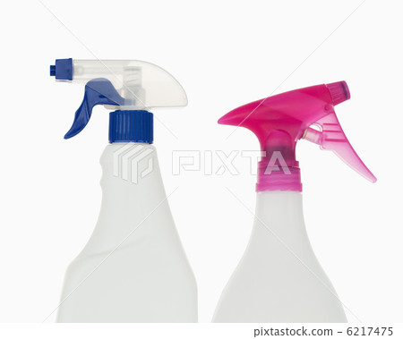 Close up of a pink and a blue spray bottles Close up of a pink and a blue spray bottles 6217475