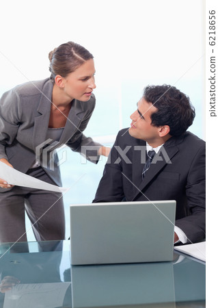 Portrait of a manager being unhappy with an employee Portrait of a manager being unhappy with an employee 6218656
