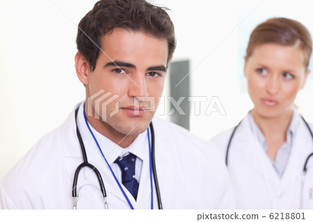 Assistant doctors standing next to each other Assistant doctors standing next to each other 6218801