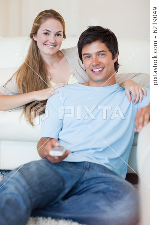 Portrait of a couple watching television 6219049