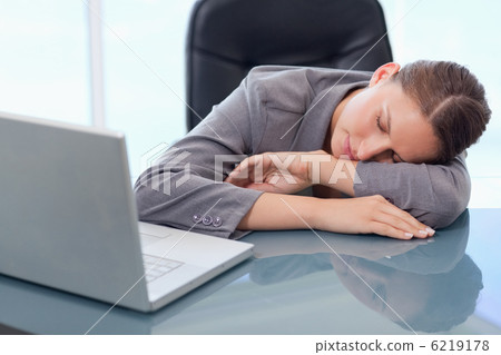 Young businesswoman sleeping 6219178