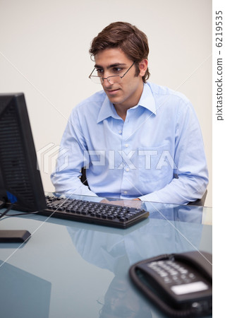 Businessman reading an e-mail Businessman reading an e-mail 6219535