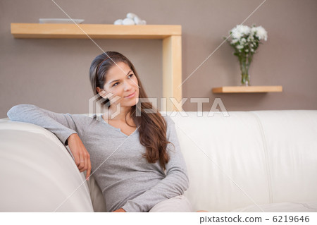 Woman sitting on the sofa Woman sitting on the sofa 6219646