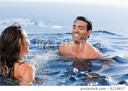 Smiling couple playing Smiling couple playing 6219657