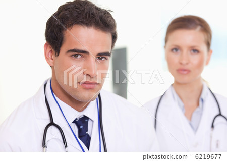 Medical assistants standing next to each other Medical assistants standing next to each other 6219677