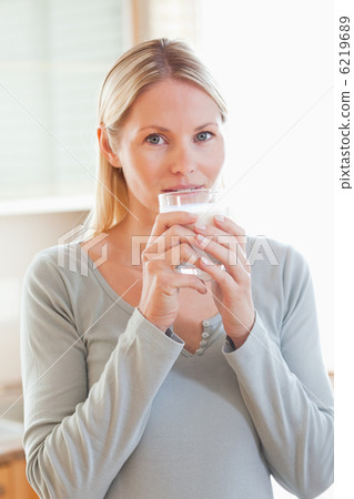 Woman drinking some water 6219689