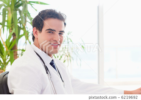 Side view of smiling doctor Side view of smiling doctor 6219692