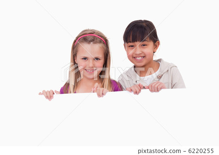 Girls behind a blank panel Girls behind a blank panel 6220255