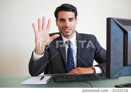 Businessman showing his hand Businessman showing his hand 6220516