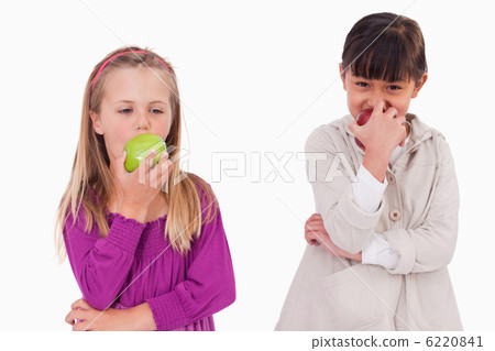 Girls eating apples Girls eating apples 6220841