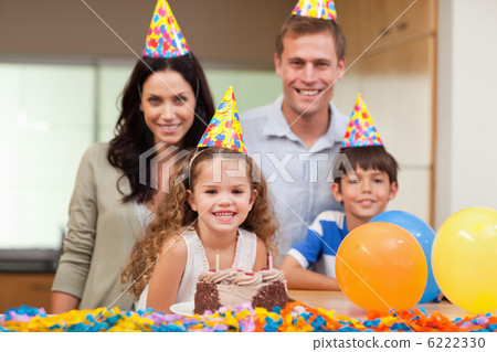 Smiling family celebrating birthday 6222330