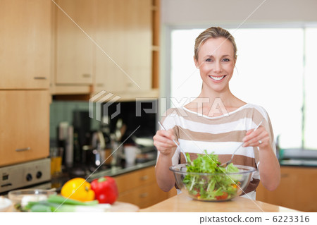 Woman preparing healthy salad 6223316