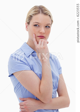 Thoughtful standing woman 6223555