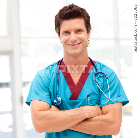 Portrait of a handsome doctor with stethoscope 6225368