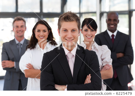 Cute business team looking at the camera 6225479