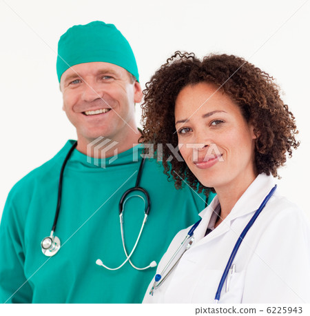 Portrait of a beautiful nurse with a surgeon Portrait of a beautiful nurse with a surgeon 6225943