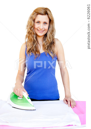 Cute woman ironing 6226061