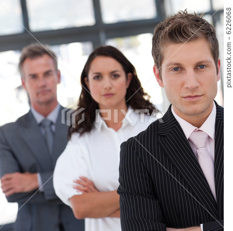 Portrait of a relaxed business team looking at the camera 6226068