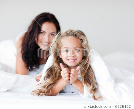 Adorable girl with her mother thumbs up Adorable girl with her mother thumbs up 6226162