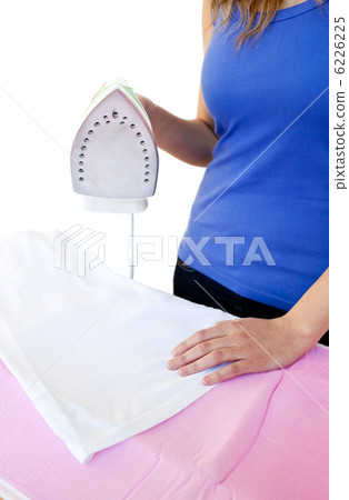 Close-up of a woman ironing Close-up of a woman ironing 6226225