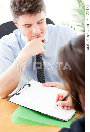 Cute businessman with a contract 6227181