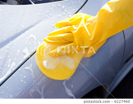 Woman cleaning a car 6227460