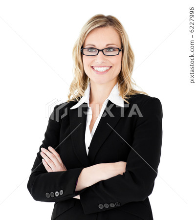 Self-assured businesswoman with folded arms Self-assured businesswoman with folded arms 6227996