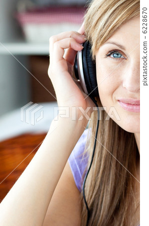 Woman listening to music and enjoy it Woman listening to music and enjoy it 6228670