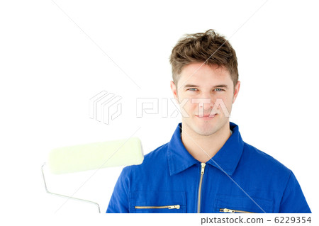 Good-looking male worker smiling at the camera 6229354