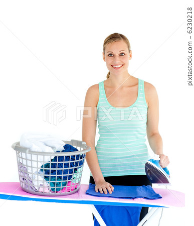 Happy woman ironing Happy woman ironing 6230218