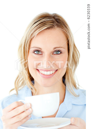Charming businesswoman enjoying her coffee 6230339