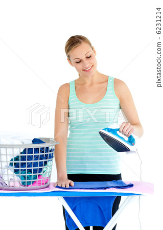 Bright woman ironing her clothes 6231214