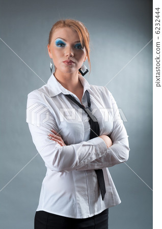 redheaded girl  in formal dress like a secretary 6232444