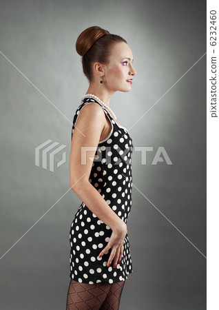 beautiful lady in a polka dot dress. 6232460