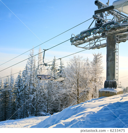 Winter morning and ski lift Winter morning and ski lift 6233475