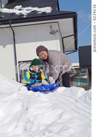 Sledding child 6234216